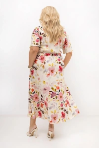 Tył sukienki Florka plus size prezentuje rozkloszowany fason midi i efektowny kwiatowy print na jasnym tle. Naturalna mieszanka bawełny i lnu zapewnia komfort noszenia oraz elegancki wygląd przez cały dzień.